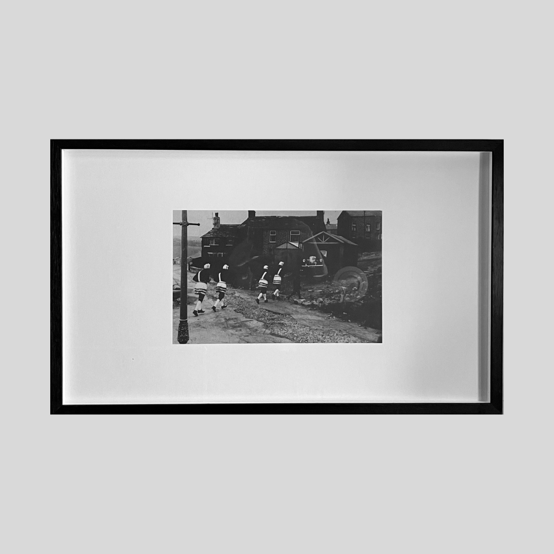 Large framed black and white print showing traditional British firefighters