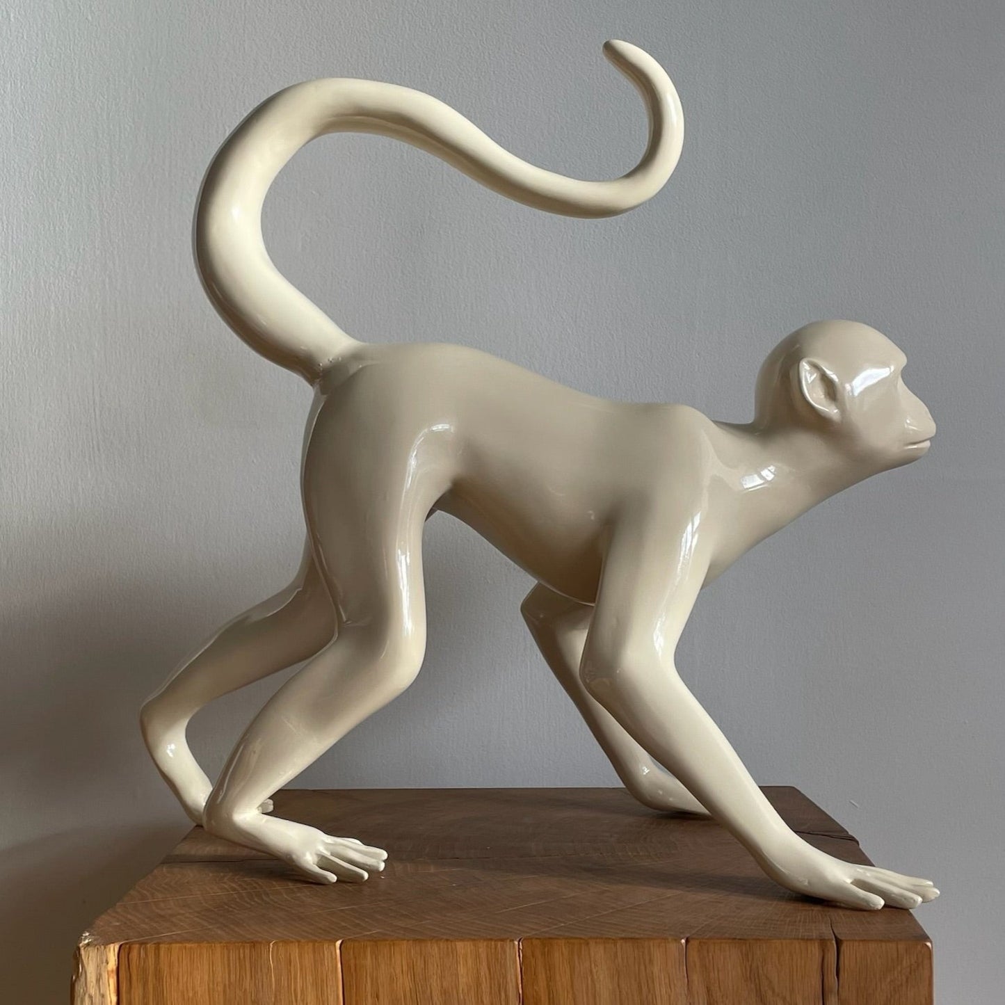 The Walking Monkey made from fibreglass sprayed in a beige high gloss finish