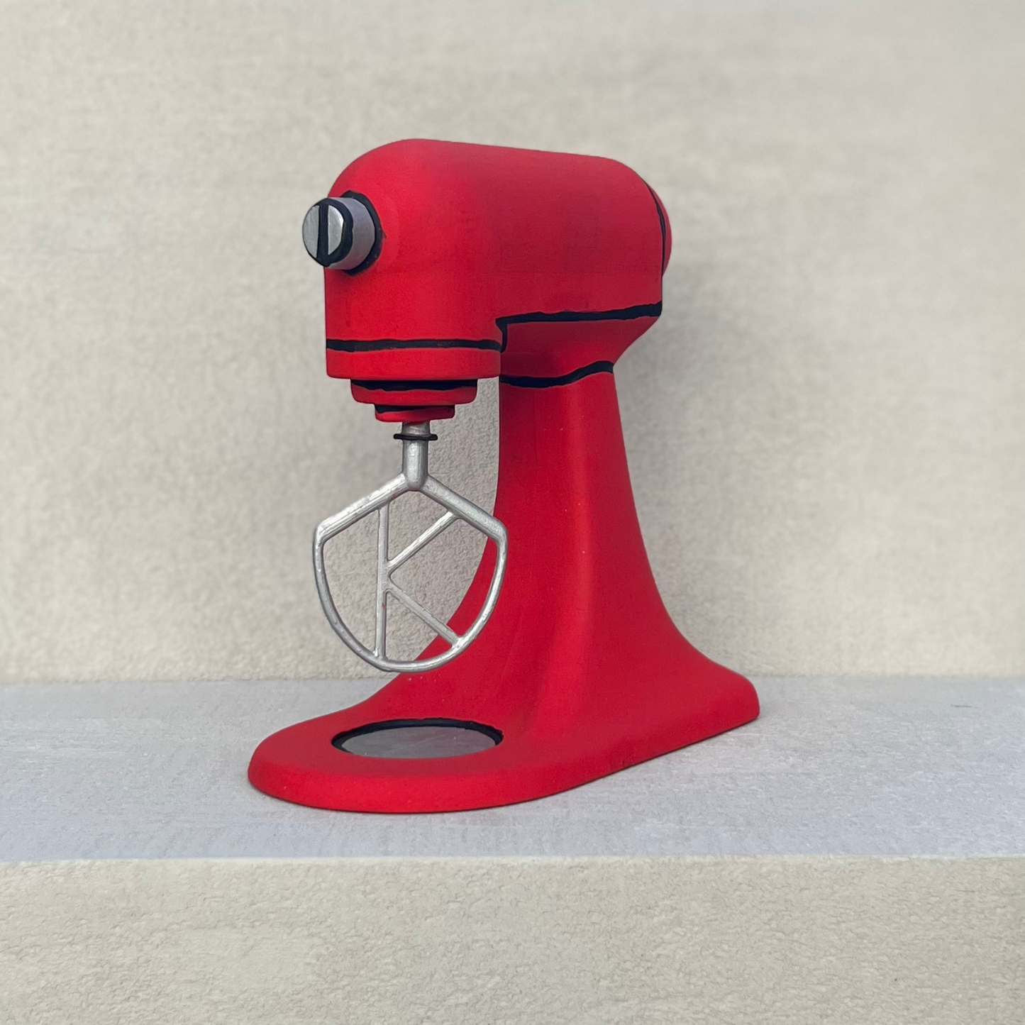 Red food mixer decorative sculpture