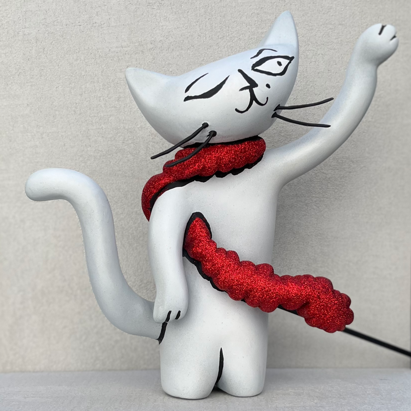 The Waving Cat