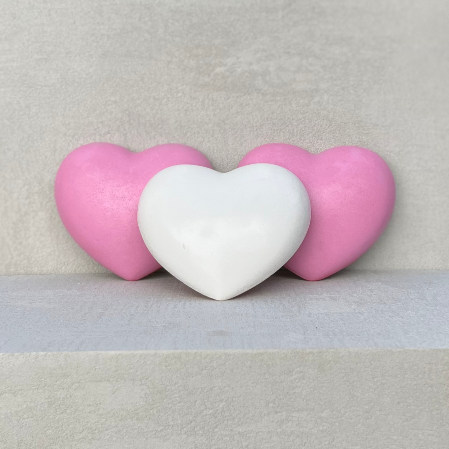White and pink mini love heart props from Fortnum & Mason 2023 window display