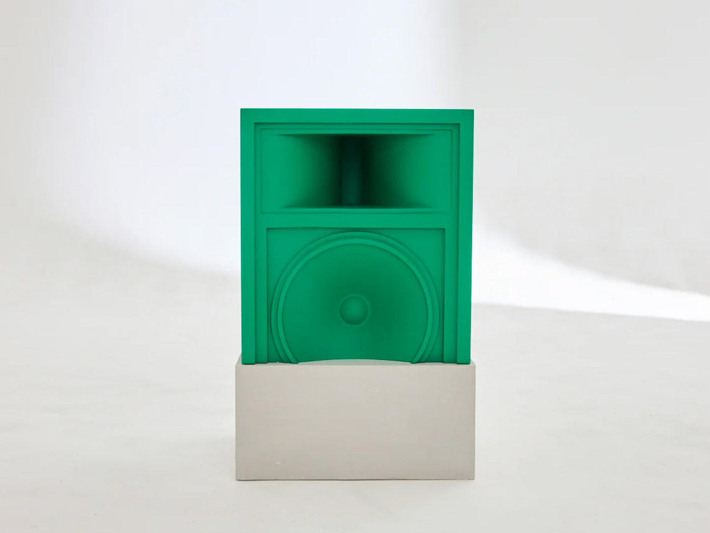 Green speaker style table with micro concrete base