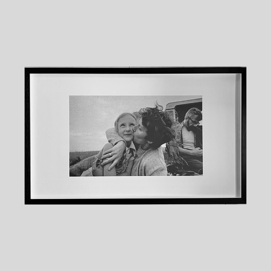 Large framed black and white iconic print showing British family