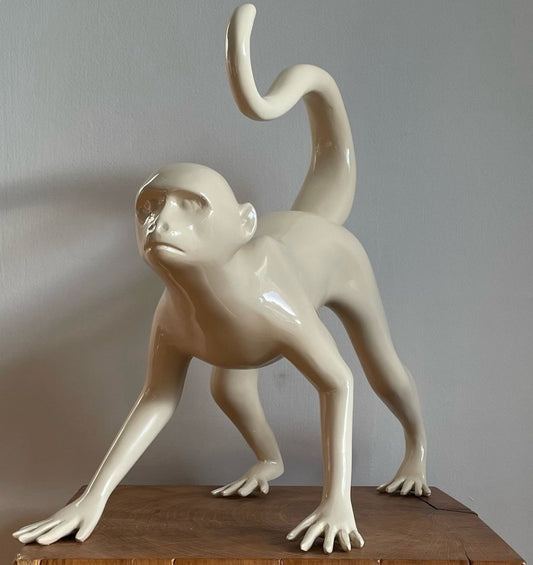 The Walking Monkey made from fibreglass sprayed in a beige high gloss finish