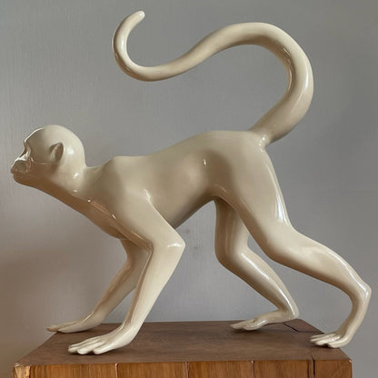 The Walking Monkey made from fibreglass sprayed in a beige high gloss finish