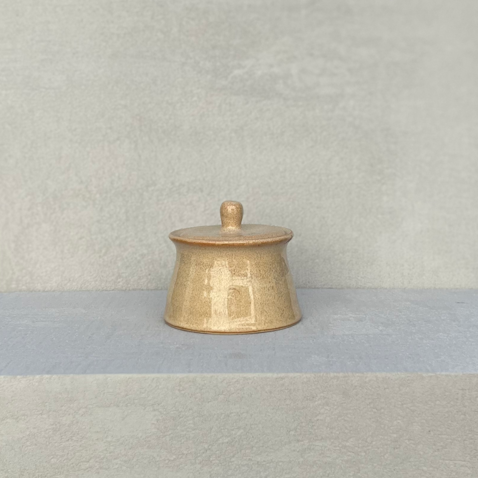 Hand made glazed ceramic pot in beige with a rustic but contemporary feel