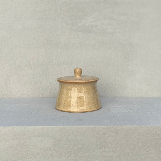 Hand made glazed ceramic pot in beige with a rustic but contemporary feel