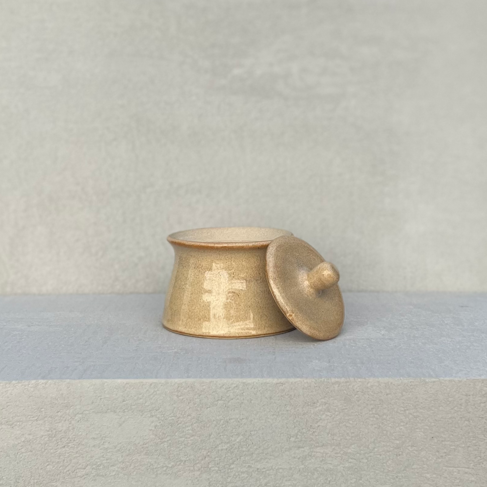 Ceramic lidded glazed pot handmade in beige