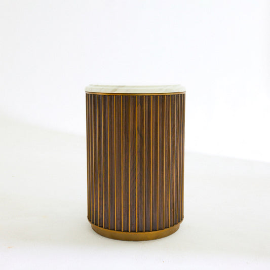Circular white marble topped dark hard wood fluted side table with brass inlay.