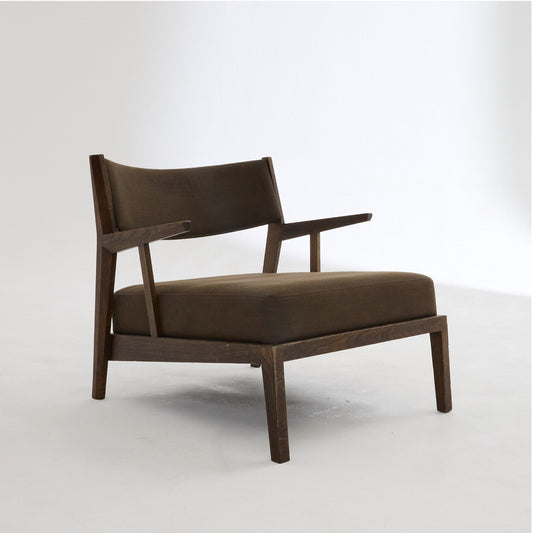 Brown upholstered armchair in minimalist mid-century style